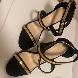 Black and gold heels